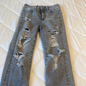 Grey American eagle next level stretch ripped skinny jeans for sale